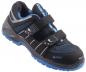 Preview: The shoe is black with blue accents. It has a sporty shape, a padded collar, and two Velcro straps. The sole is textured and provides good grip.