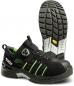 Preview: The image shows a black safety shoe with green accents. It features a sturdy sole with deep tread and a lacing system that can be adjusted with a twist lock.