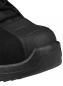 Preview: The image shows the tip of a black work shoe. The sole is reinforced and has a smooth, robust texture. The shoe appears sturdy and offers good protection.