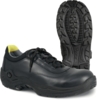 Preview: The image shows a black shoe with laces. It has a sturdy, rubberized sole with a non-slip pattern. The interior is light gray, with a yellow accent at the heel.