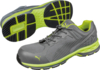 Preview: The image shows a pair of gray sports shoes with green accents. They have a flexible sole with a grippy tread and laces. The shoes are designed to be modern and sporty.