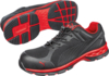 Preview: The image displays athletic shoes in black and red. They feature a breathable structure, a grippy sole with a visual tread, and a modern, sleek shape.