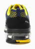 Preview: The shoe has a dark upper with yellow accents. It is sportily designed, with a padded finish and a non-slip sole that provides stability.