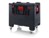 Preview: It is a black plastic box with red handles and accents. It is rectangular, has a smooth surface, and stands on four wheels for easy mobility.