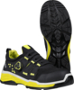 Preview: The image shows a pair of sporty, black shoes with bright yellow accents. One of the shoes is equipped with a quick-lacing system that is visible on the top. The sole is textured and robust.