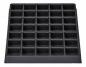 Preview: The image shows a rectangular, black baking pan with 36 evenly distributed, small indentations suitable for muffins or cupcakes. The surface is smooth.