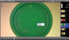 Preview: The image shows a round, green area. In the center, there is a label that reads "Colour Problem". The background is light, and there are several small image previews on the right edge.