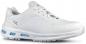 Preview: The shoe is sporty, in pure white with breathable upper material. It has a flat sole with blue cushioning elements on the bottom and classic lacing.