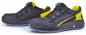 Preview: The image shows a pair of athletic shoes in black with yellow accents. They feature a modern shape, breathable material, and a rubber sole with good grip. Closure with a convenient quick-lacing system.