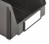 Preview: The image shows a narrow, black plastic organizer box with an open front and an empty label holder. The box has rounded edges.