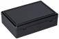 Preview: It is a rectangular, black box with a flat lid. The surface is smooth and glossy. The box has a foldable or removable closure mechanism.