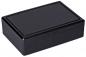 Preview: It is a rectangular, flat box in black. It has a smooth, deliberate lid and a simple, modern shape. The surface is glossy and slightly reflective.