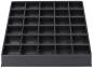 Preview: The image displays a rectangular, flat tray made of black plastic, divided into 36 small square compartments. The compartments are evenly arranged in six rows and six columns.