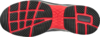 Preview: The image shows the underside of a sports shoe. The sole is primarily black with red accents. It has a textured tread with various grooves and studs for better grip.