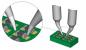 Preview: The image shows a circuit board with several components. Two fine soldering nozzles are aimed at the components to connect them. An enlarged view shows details of the solder joint.