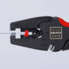 Preview: The image shows a black wire stripper with red handles. At the tip, there are cables and colored markers (white and red) visible. The pliers are intended for stripping wires.