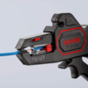 Preview: The image displays an innovative wire stripper from KNIPEX. It features a handle with a visible blue wire. The pliers include various scales and controls for precise application.