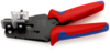 Preview: The image shows a crimping tool with black and red-blue handles. It has a metallic working surface with a transparent cover used for processing cables.