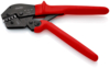 Preview: The image shows a black-red crimping tool. It has two red handles and a metallic head with various grooves and blades for connecting wires.