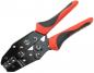 Preview: The image shows a cable cutter with red rubber grips. It has a black metal plate with several openings and a mechanism for wire twisting. The grips are ergonomically shaped.