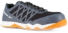 Preview: The shoe is sporty with a black upper and gray mesh elements. A bright, dotted sole in white and orange provides good grip. The shoelaces are black.