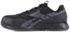 Preview: The image shows a black Reebok sports shoe. It features a modern design with a textured surface and gray design elements. The sole is stable and slightly elevated.