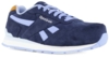 Preview: The shoe is a low-cut sneaker in dark blue suede. It features light, lilac accents and a white rubber sole. The logo "Reebok" is visible on the shoe.