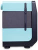 Preview: The image displays a compact, box-shaped refrigerator in blue and black. It features a smooth surface, a durable strap, and round feet. The top is light blue.