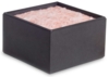 Preview: The image shows a square, black container with a soft, fluffy, pink surface inside. It has rounded edges and appears compact and decorative.