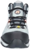 Preview: The image shows a gray shoe with a sturdy rubber-like sole. It has round laces and is complemented by small orange accents. A logo is visible on the tongue.