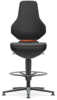 Preview: The chair has a tall, narrow backrest and a padded seat. It stands on a stable base with five casters and a round footrest. The color scheme is predominantly black.