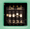 Preview: The image shows a switch labeled "ON" and "WE" on a black background. Below are the numbers 1 to 4 in light font. The switch has three movable elements.