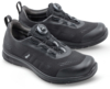 Preview: The image shows a pair of black athletic shoes. They are made from durable material, have a flexible sole, and feature an innovative closure mechanism with a round button.