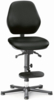 Preview: The chair is black, has a padded seat, and a high backrest. Under the seat, there is a footrest. The legs are sturdy and have casters.