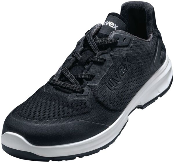 The shoe is a sporty sneaker in black color. It has a breathable surface structure, padded tongue, and a white, thick sole. The laces are black.