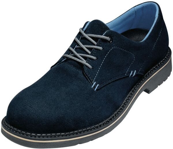 The shoe is a dark blue, elegant lace-up made of soft suede. It has a flat, black rubber sole and light-colored laces. The interior is in light blue.