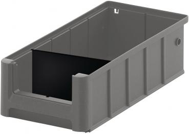 The image shows a rectangular, gray plastic box. It has vertical grooves on the sides and an opening on one of the shorter sides. The interior is dark, almost black.