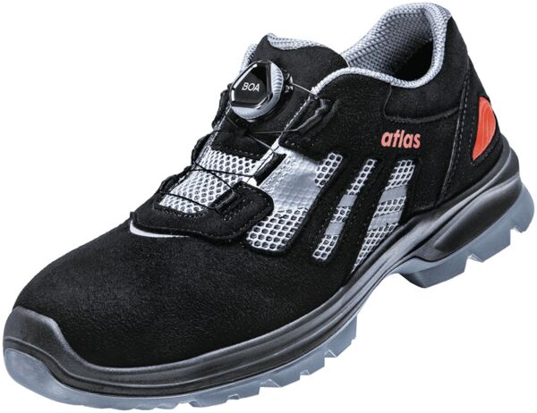 The shoe is dark and sporty, with a sturdy black upper and silver mesh inserts. It has a non-slip sole and a comfortable quick-lacing system.