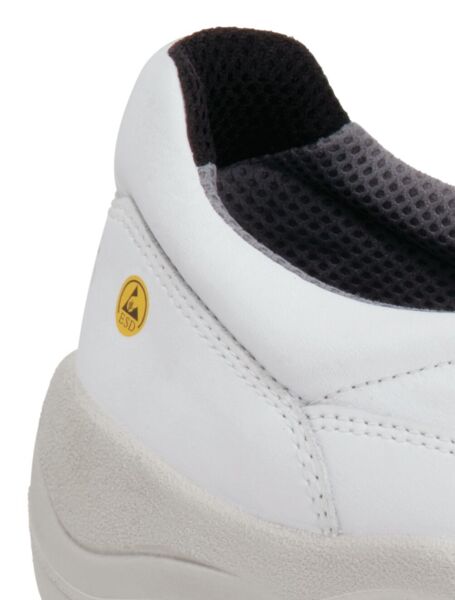 The image shows a white shoe with a gray lining. On the side, there is a yellow emblem with the inscription "ESD," indicating its anti-static property.