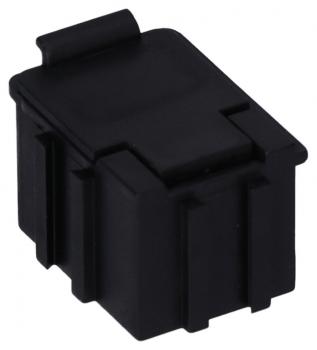 The image shows a small, rectangular, black plastic block with slightly rounded edges and a protruding tab at the top. It has vertical grooves on the sides.