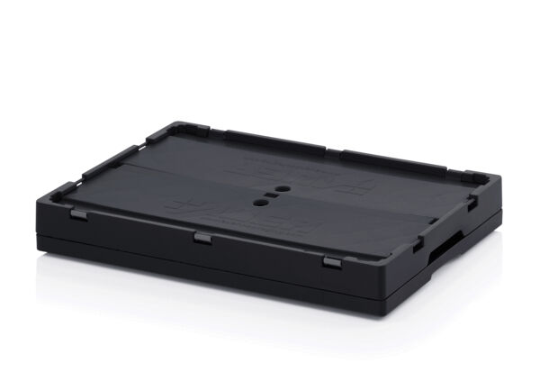 The image shows a black, rectangular plastic plate. It has a flat surface with small holes in the middle, and there is a textured border along the sides.