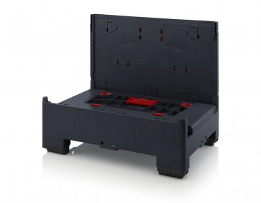 The image shows a black, rectangular box with a hinged lid. Inside, there are red and black inserts for tools or accessories. The box appears sturdy and functional.