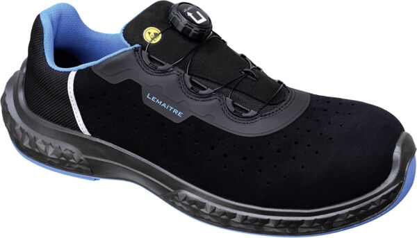 The shoe is black with blue accents. It has a non-slip sole and a special closure mechanism. The surface is perforated for better breathability.