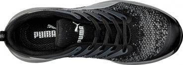 The image shows a black sports shoe with a gray pattern and gray laces. The lining is black, and the Puma logo is visible on the tongue.