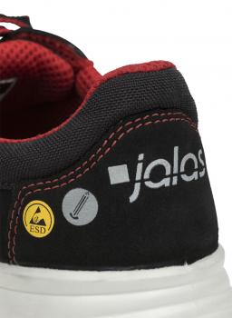 The image shows the back of a black shoe with red accents. On the upper, it says "jalas". There are symbols for electrical safety (ESD) and a protective object.