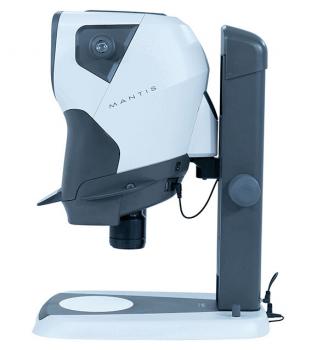 The image shows a technical device called Mantis, which looks like a microscope. It has a curved shape, is predominantly white and gray, and stands on a stable base.