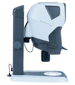 The image shows a device called Mantis, a continuously height-adjustable microscope. It has a simple, modern design in white and gray with a large lens at the front.