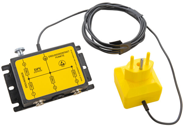 The image shows an electronic device with a yellow casing. It has multiple sockets and a corresponding yellow plug with two pins. A long cable connects both parts.