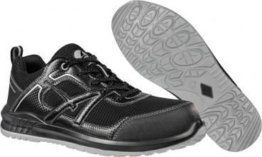 The image shows a black sports shoe with a textured, gray sole. The shoe has laces and a breathable upper, which looks sporty and modern.