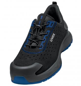 The shoe is sporty and modern, primarily in black with blue accents. It features a breathable upper and a flexible, non-slip sole, ideal for active movements.